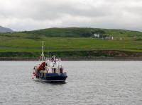 Un bateau près du port de Cleggan